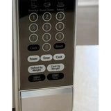 Wholesale-Oster OGYK0703 Microwave Stainless Steel Front 0.7 CF-Electro Vision Inc
