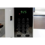 Wholesale-Oster OGYK0703 Microwave Stainless Steel Front 0.7 CF-Electro Vision Inc